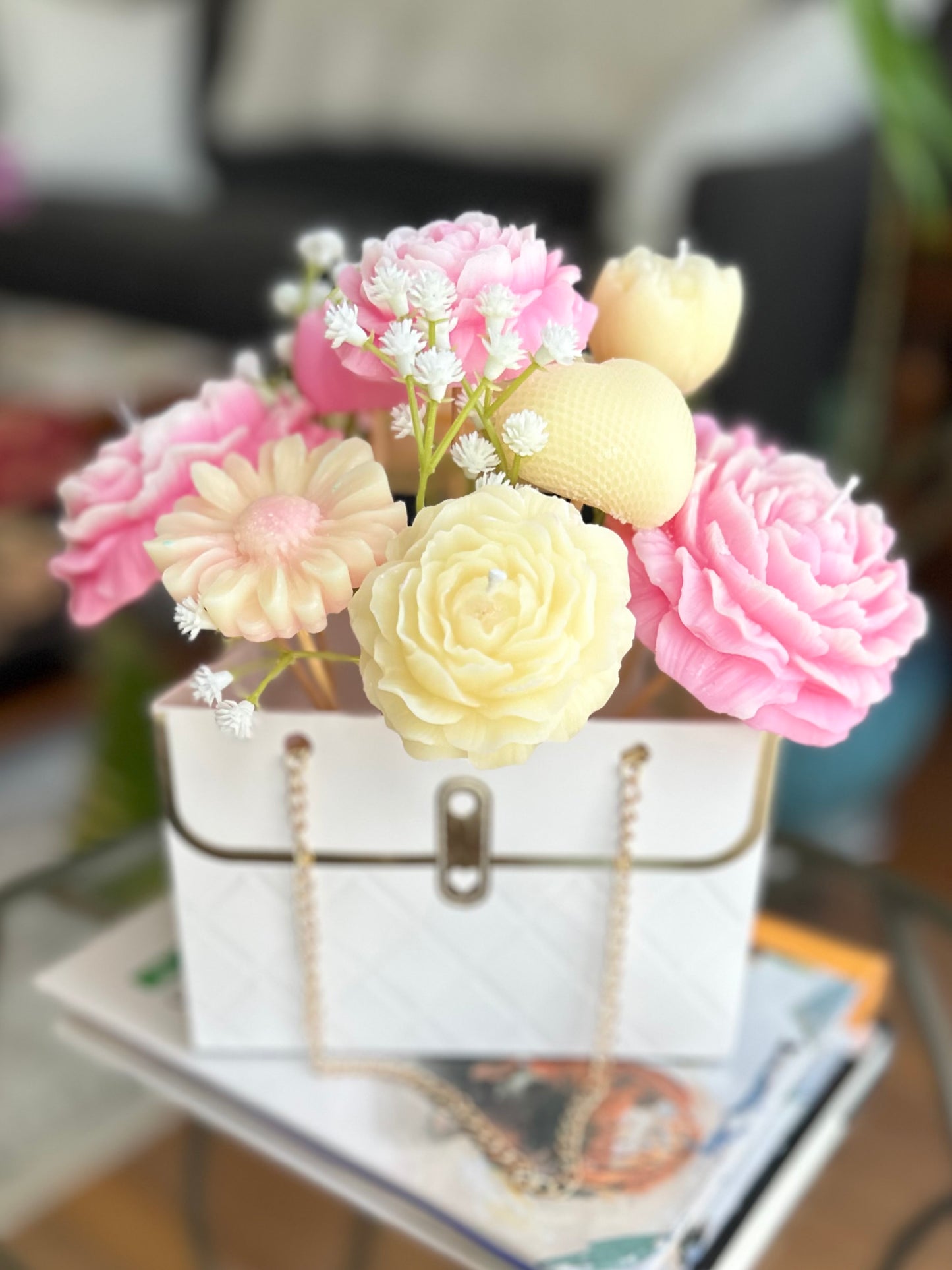 Custom candle flower arrangement featuring handcrafted candles with floral accents, perfect for events and special occasions.
