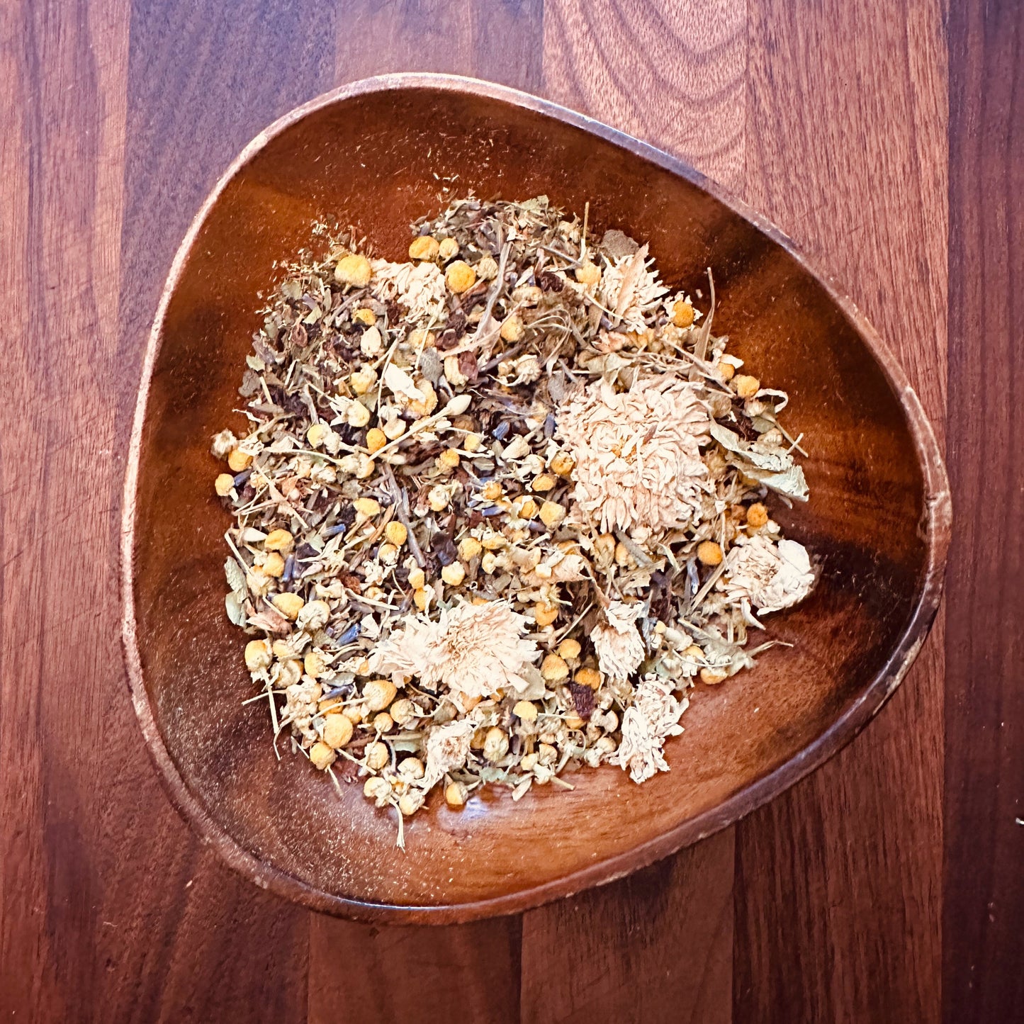 Relaxing herbal tea blend with chamomile, lavender, and other dried herbs