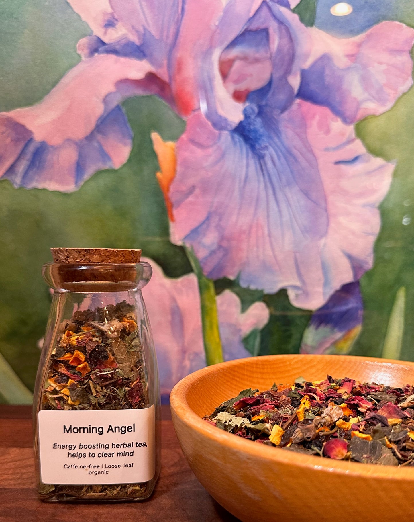 Loose leaf herbal tea blend with organic herbs on rustic wooden table